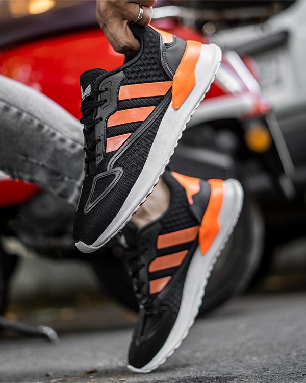كفش ورزشي Adidas مردانه مشكي نارنجي مدل Siban