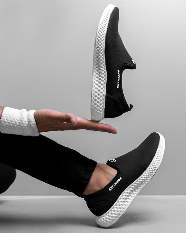 كفش ورزشيSKECHERS مردانه مشكي سفيد مدل Lavin-