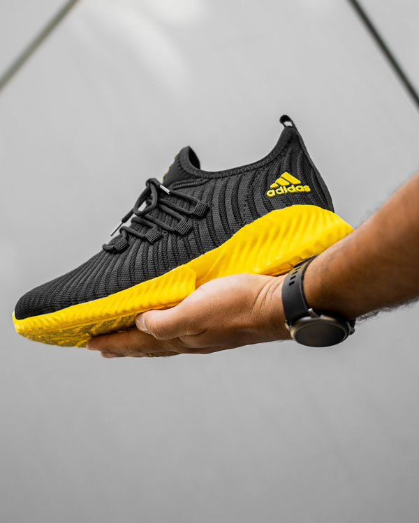 کفش ورزشی Adidas مردانه مشکی زیره زرد مدل River