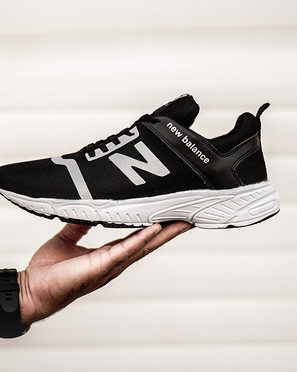 كفش ورزشي New Balance مردانه مشكي مدل Rolan