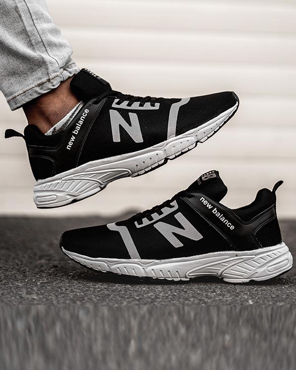 كفش ورزشي New Balance مردانه مشكي مدل Rolan