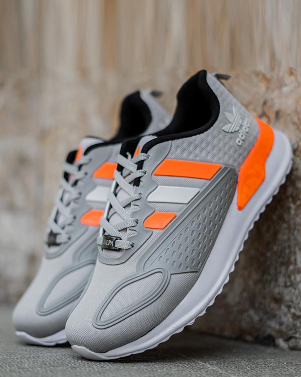 کفش ورزشی Adidas مردانه طوسی نارنجی مدل Tilda