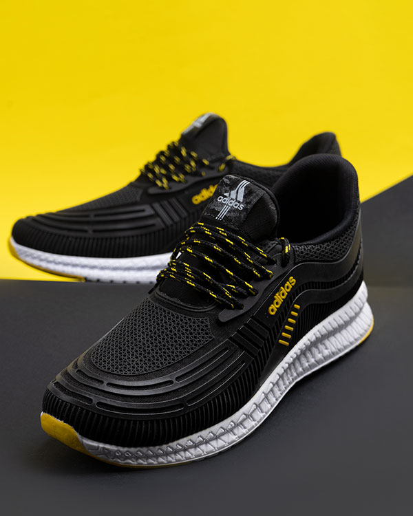 کفش ورزشی Adidas مردانه مشکی زرد مدلPardad