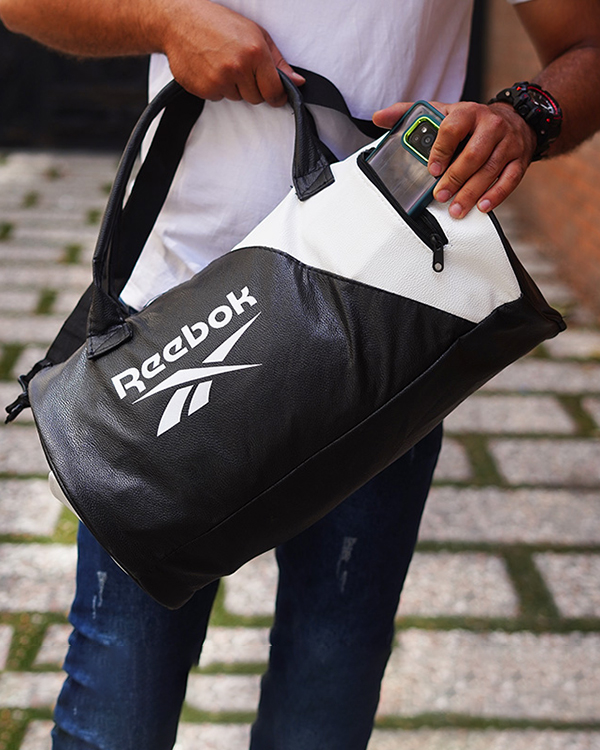 ساک ورزشی Reebokمشکی سفید مدل waren
