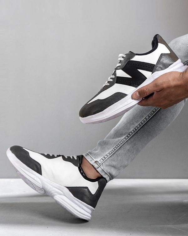کفش ورزشی New Balance مردانه مشکی سفید مدل Bret