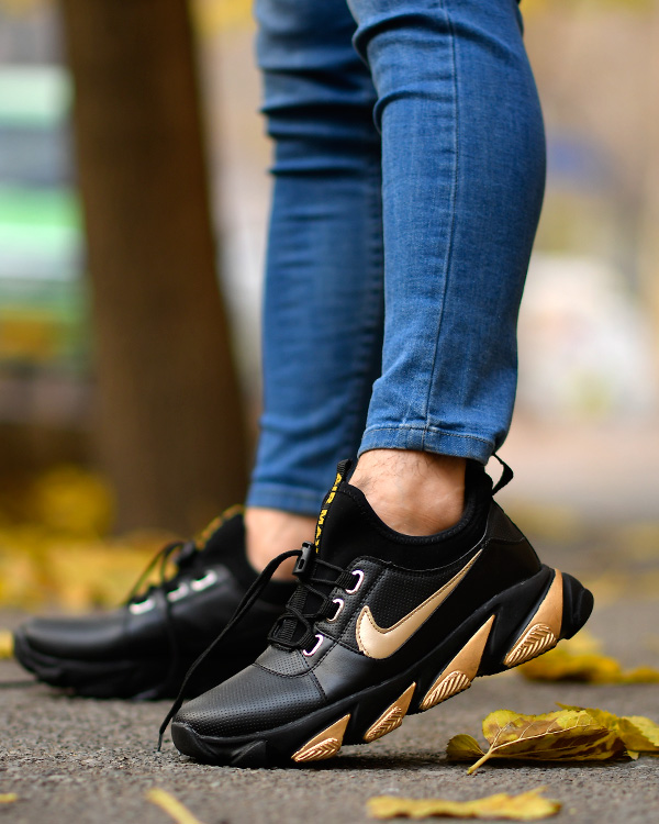 کفش مردانه NIKE طرح PIKA مشکی- طلایی مدل 4582